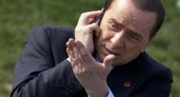 Берлускони предпочел телефонный разговор церемониям саммита НАТО
