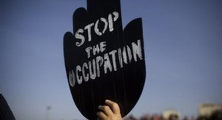 "Квартет" посредников осуждает поселенческие планы Израиля