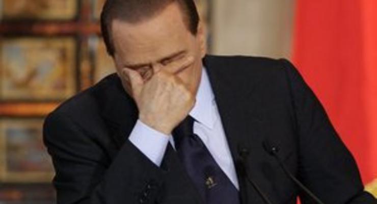 Берлускони предстанет перед судом по делу о связях с несовершеннолетней