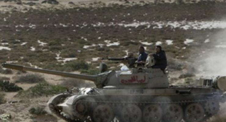 Ливийские повстанцы отступают из Рас-Лануфа