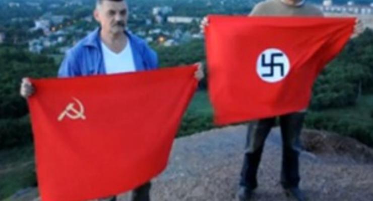 Двое донецких шахтеров сожгли на терриконе красные флаги