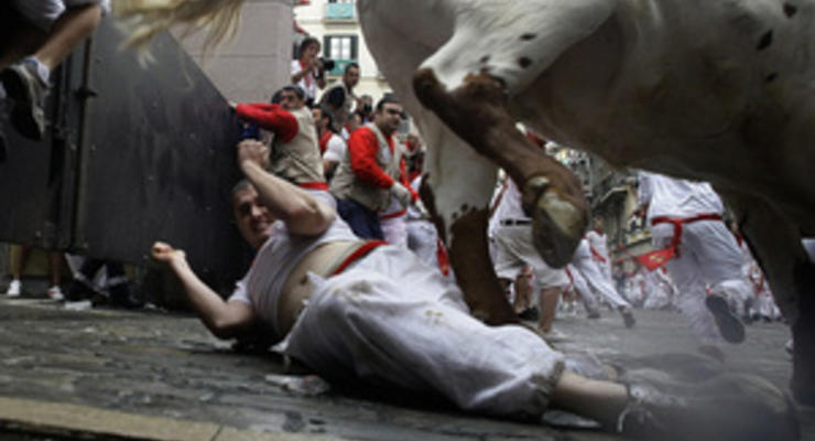 Фотогалерея: Быка за рога. В Испании проходит легендарный фестиваль Сан-Фермин