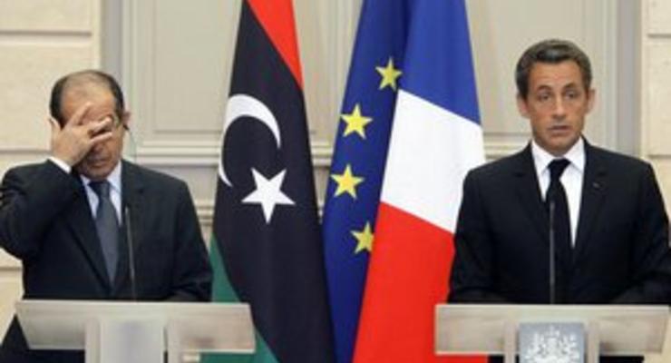 Французские СМИ: В обмен на помощь повстанцам Париж получит 35% нефтяных контрактов в Ливии