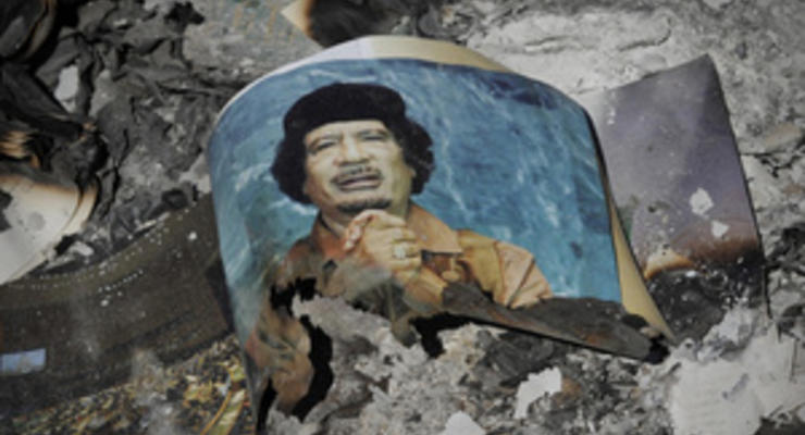 ПНС: Тело Каддафи перевезли в секретное убежище