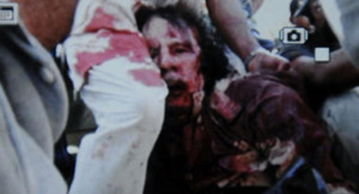 Аль-Джазира показала фотографию мертвого Каддафи