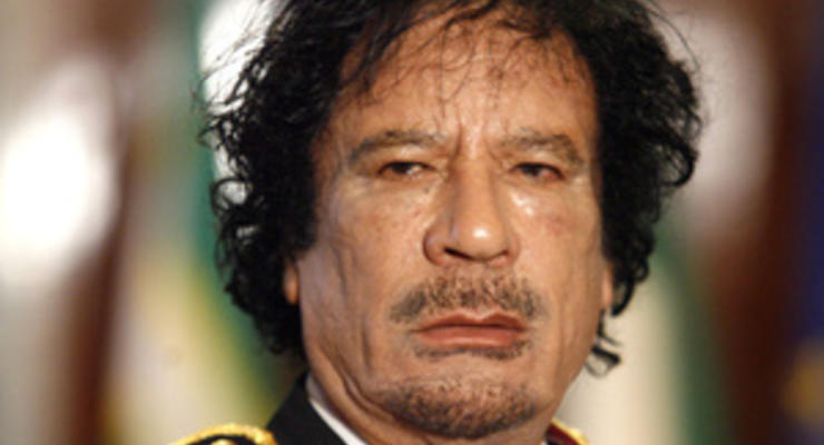 СМИ: В Каддафи стреляли из девятимиллиметрового оружия