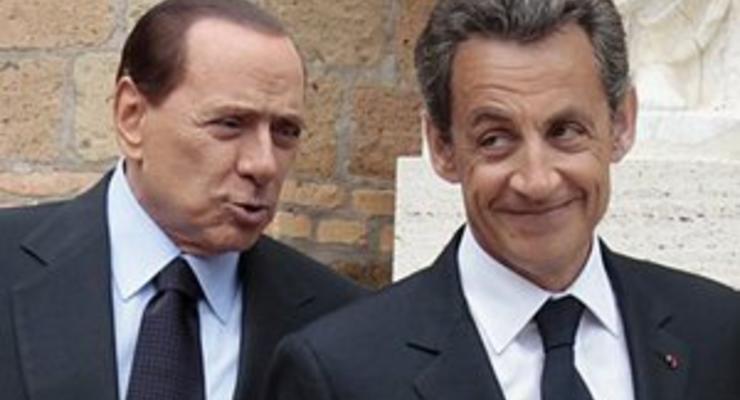 Рим раскритиковал Саркози и Меркель за насмешку над Берлускони