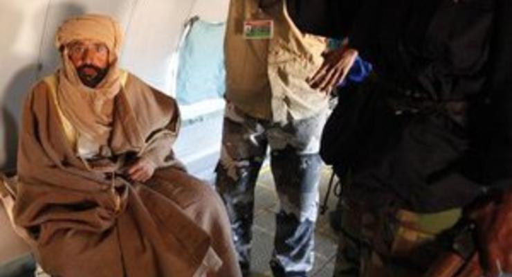 Ливийцы, арестовавшие сына Каддафи, отказываются передать его суду