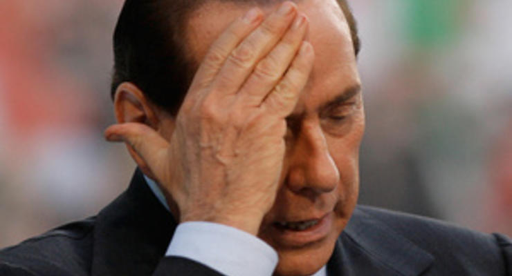 Суд Милана приговорил Берлускони к четырем годам тюрьмы