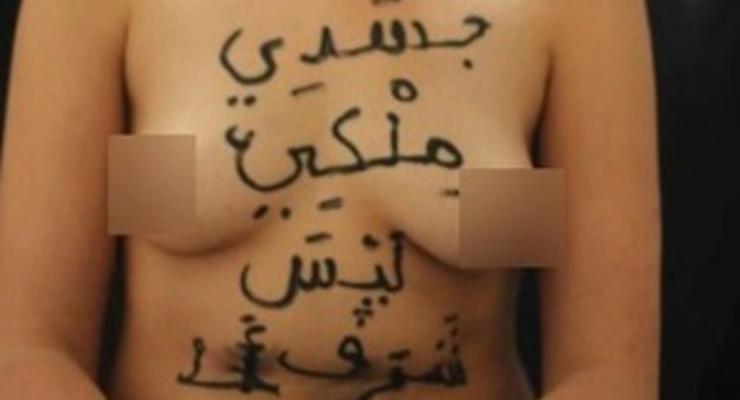 В Тунисе активистку FEMEN за фото топлес приговорили к смертной казни