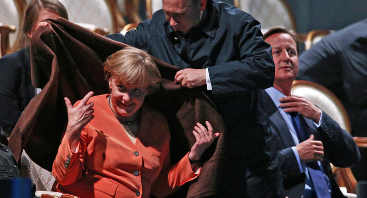 Как Путин согрел Меркель. Фотогалерея саммита G20