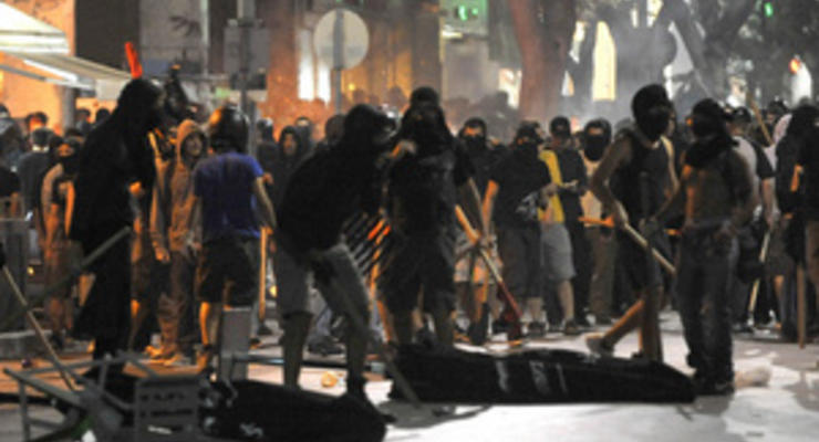 Греки протестуют из-за сокращений бюджета и убийства антифашиста