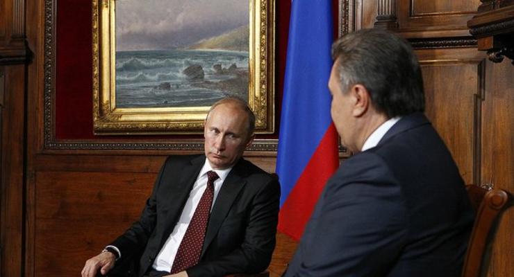 Янукович встретился с Путиным, но не поедет на Мальту