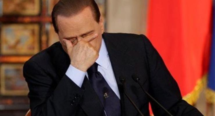 Из-за гигантских долгов Берлускони не будет праздновать Рождество