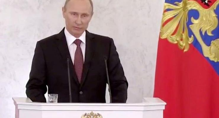 Путин: РФ не будет вводить визовый режим с Украиной и отвечать на санкции США