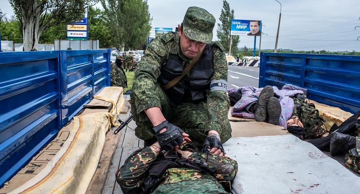 День в фото: бои между батальонами Восток и Донбасс и обещания Путина