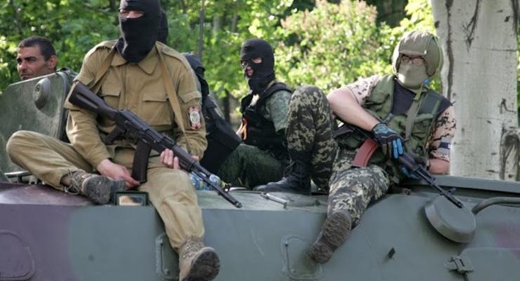 Луганский облсовет призвал силовиков и боевиков сложить оружие