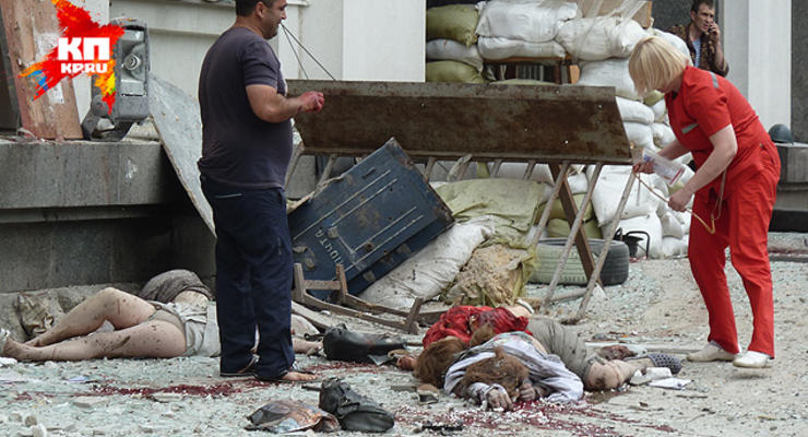 Фото и видео Луганска после взрыва: трупы, воронки и разрушения