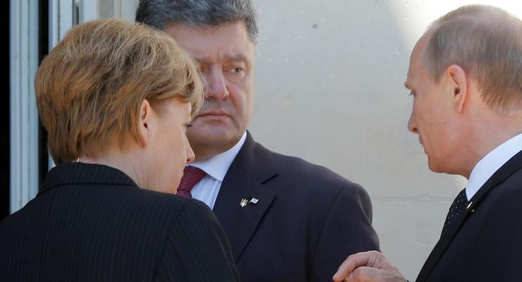 Путин и Порошенко решили урегулировать кризис в Украине мирным путем - Песков