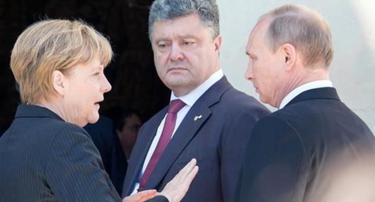 Путин, Меркель и Олланд выступили за прекращение АТО