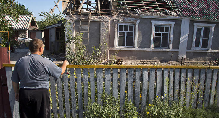 Фото недели: обстрел Донецка, уборка Майдана и протесты в Харькове