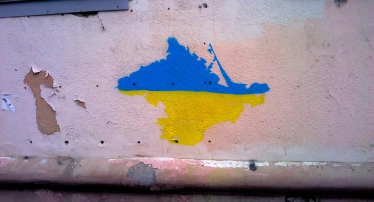 Российский Омск разукрасили желто-синими граффити с Крымом