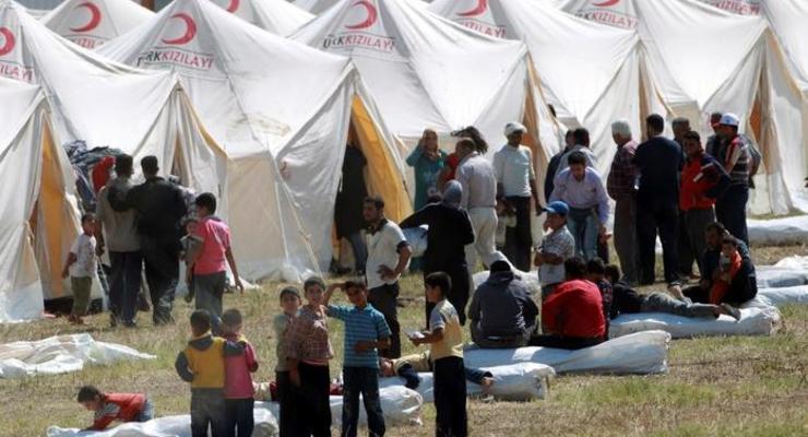 Из зоны боев с "Исламским государством" в Турцию бежали свыше 130 тысяч сирийских курдов