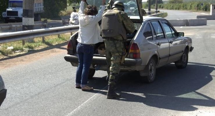 В прифронтовых городах Донбасса ищут мины и ловят преступников (фото)
