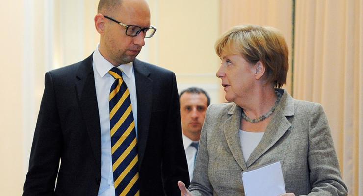 Правозащитники призвали Меркель надавить на Яценюка из-за АТО