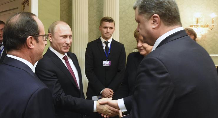 Появилось видео, как Путин и Порошенко жмут руки в Минске