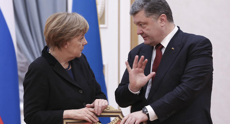 Порошенко и Меркель выступили за встречу глав МИД нормандской четверки