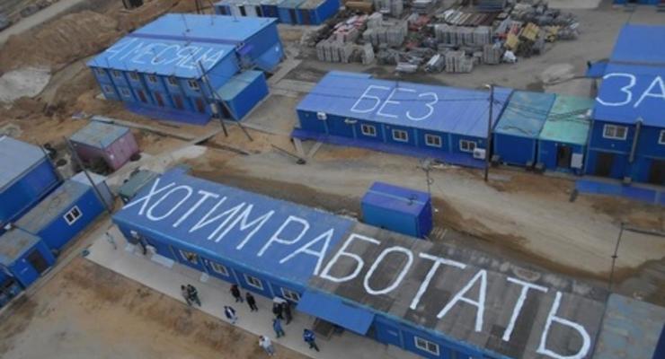 Часть строителей российского космодрома "Восточный" продолжили забастовку