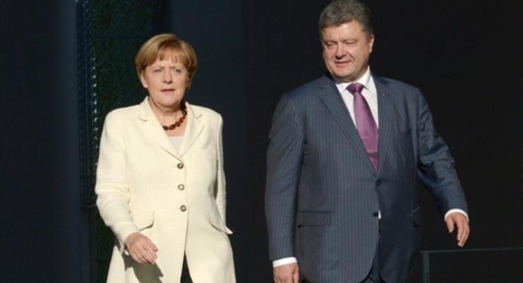 Порошенко рассказал Меркель об эскалации на Донбассе