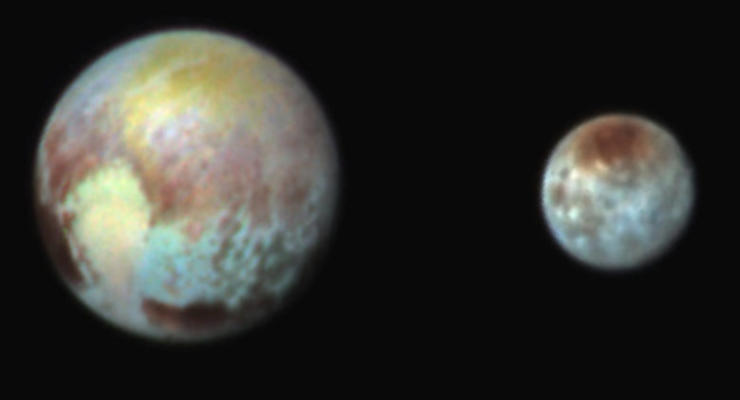 NASA опубликовало снимки Плутона и его спутника Харона