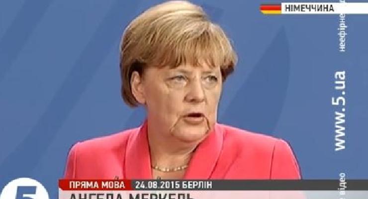 Необходимо полностью выполнять Минск-2 - Меркель