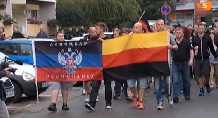 Немецкие неонаци вышли на марш с флагом ДНР
