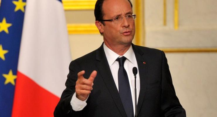 Олланд пригрозил санкциями за отказ от квот на мигрантов