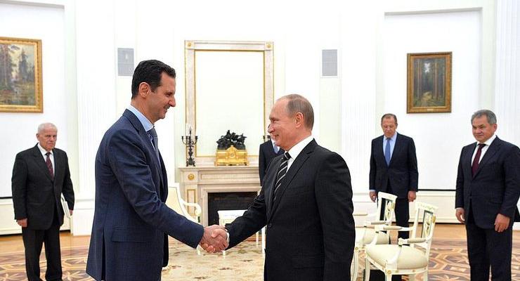 Как Путин и Асад встретились в Москве: фоторепортаж
