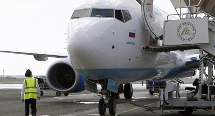 Самолет с останками жертв крушения A321 прибыл в Санкт-Петебург