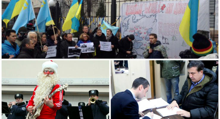 День в фото: Саакашвили в НАБУ, татары на митинге в Киеве и Дед Мороз с гитарой