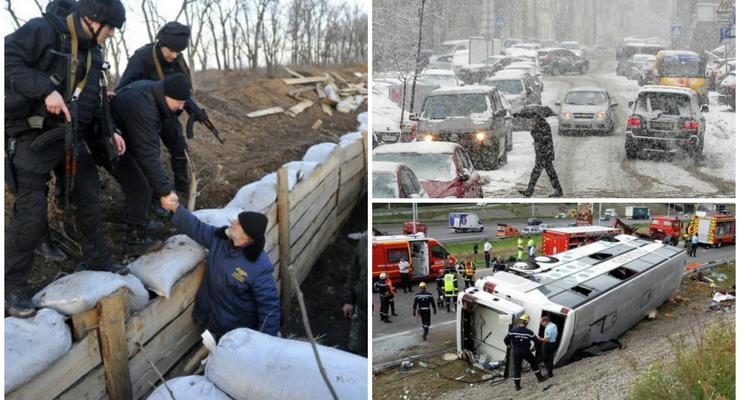 День в фото: Турчинов на передовой, авария с футболистами и снегопад в Киеве