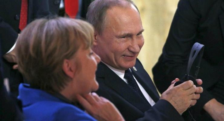 Премьер РФ: Путин и Меркель говорят преимущественно об Украине
