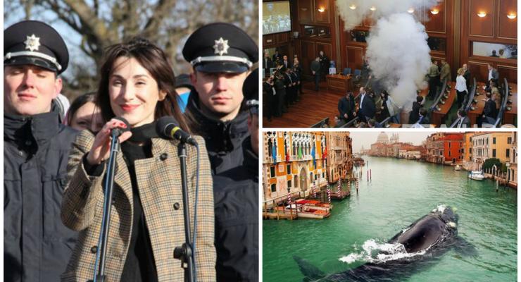 День в фото: Згуладзе с полицейскими, газ в парламенте Косово и кит в Венеции
