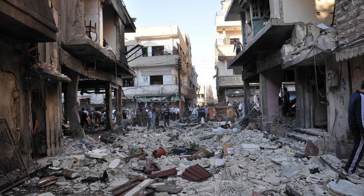 В разрушенный бомбардировкам сирийский Хомс возвращаются люди