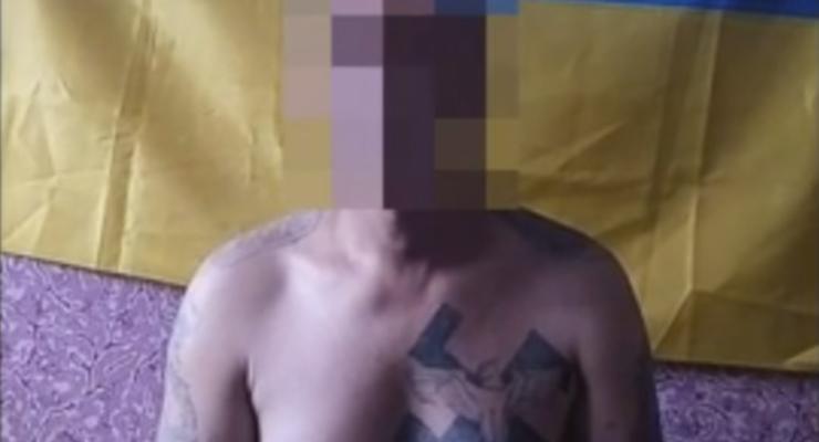 В зоне АТО задержан боевик со свастикой на груди