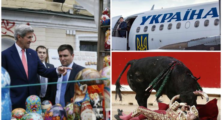 День в фото: Керри в Киеве, Порошенко в Польше и коррида в Испании