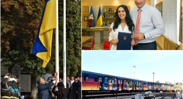 День в фото: Флаг Украины на Софийской площади, поезд-мурал в метро Киева и квартира для Джамалы