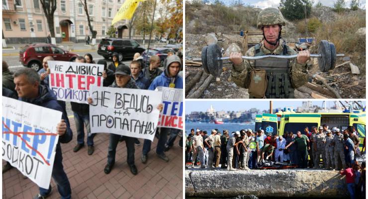 День в фото: протест в Киеве, упражнения военнослужащего и крушение судна с мигрантами