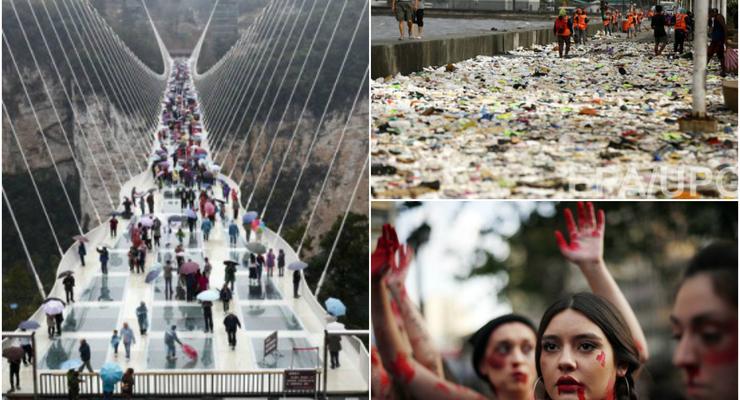 День в фото: кровавый протест в Чили, туристы на стеклянном мосту в Китае и мусор на Филиппинах