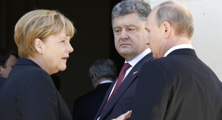 Порошенко и Путин спорили в Берлине на повышенных тонах